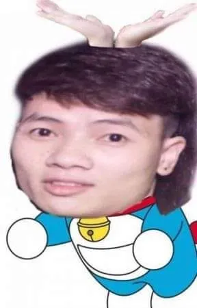 ảnh meme Khá Bảnh Doraemon múa quạt làm chong chóng tre